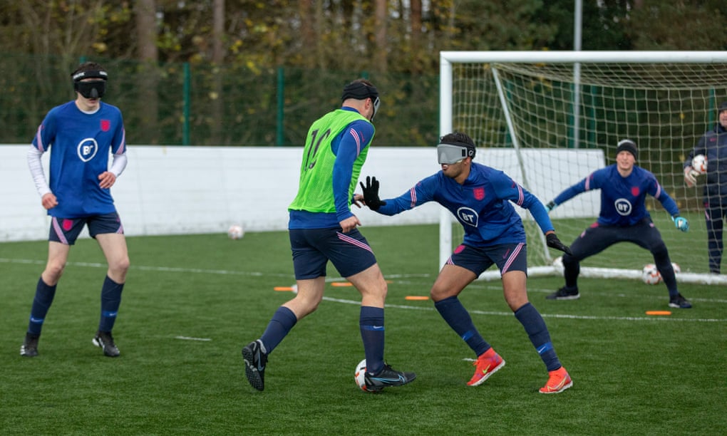 England’s blind football team training at St George’s Park last week. They played Germany twice and bedded in new players during their training camp. Photograph: Andrew Fox/The Guardian
